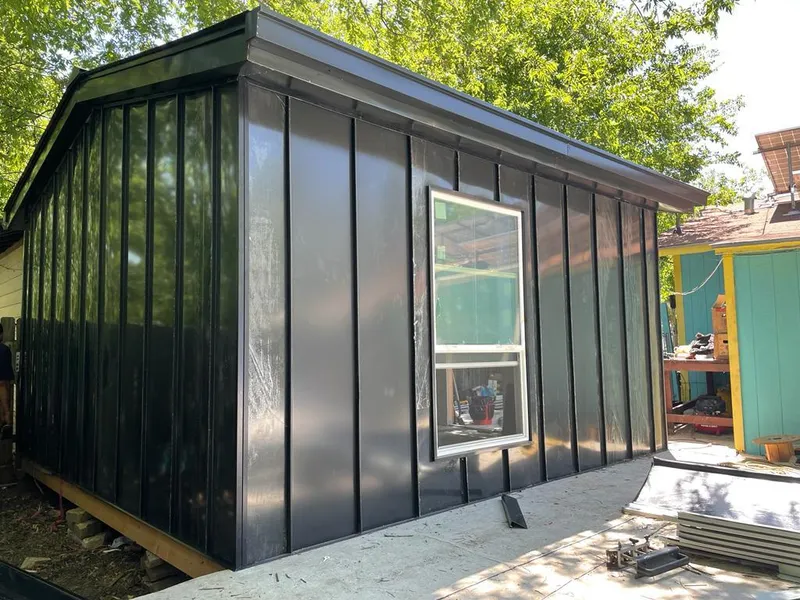 Black standing seam metal wall panels for Metal Roof Installation in Kearny